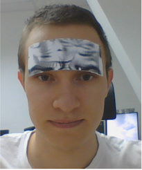 figure five from "On adversarial patches: real-world attack on ArcFace-100 face recognition system", showing an adversarial patch implemented as a black-and-white forehead sticker